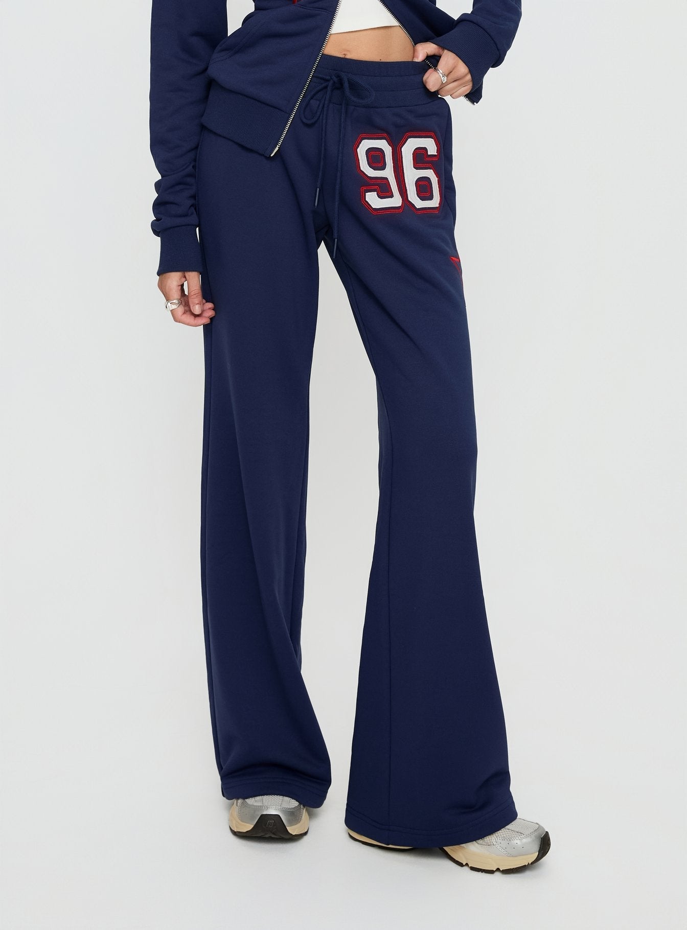 Kari Distressed Patch Track Pant Navy Multi