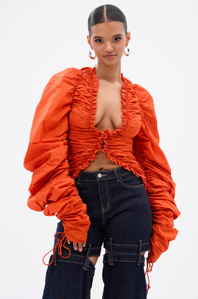 IN IT TO WIN IT RUCHED BLOUSE