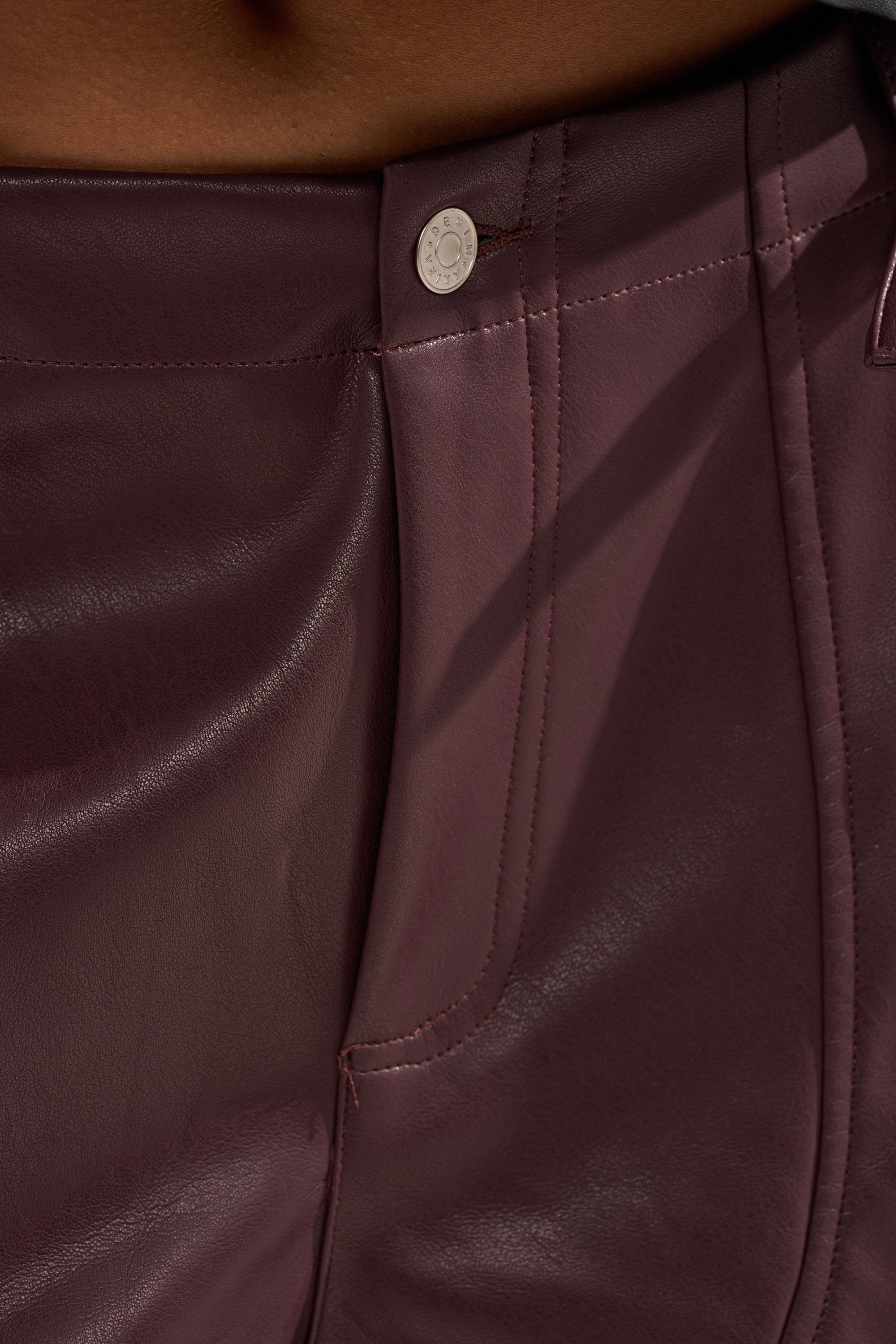 OVER DONE FAUX LEATHER BERMUDA SHORT